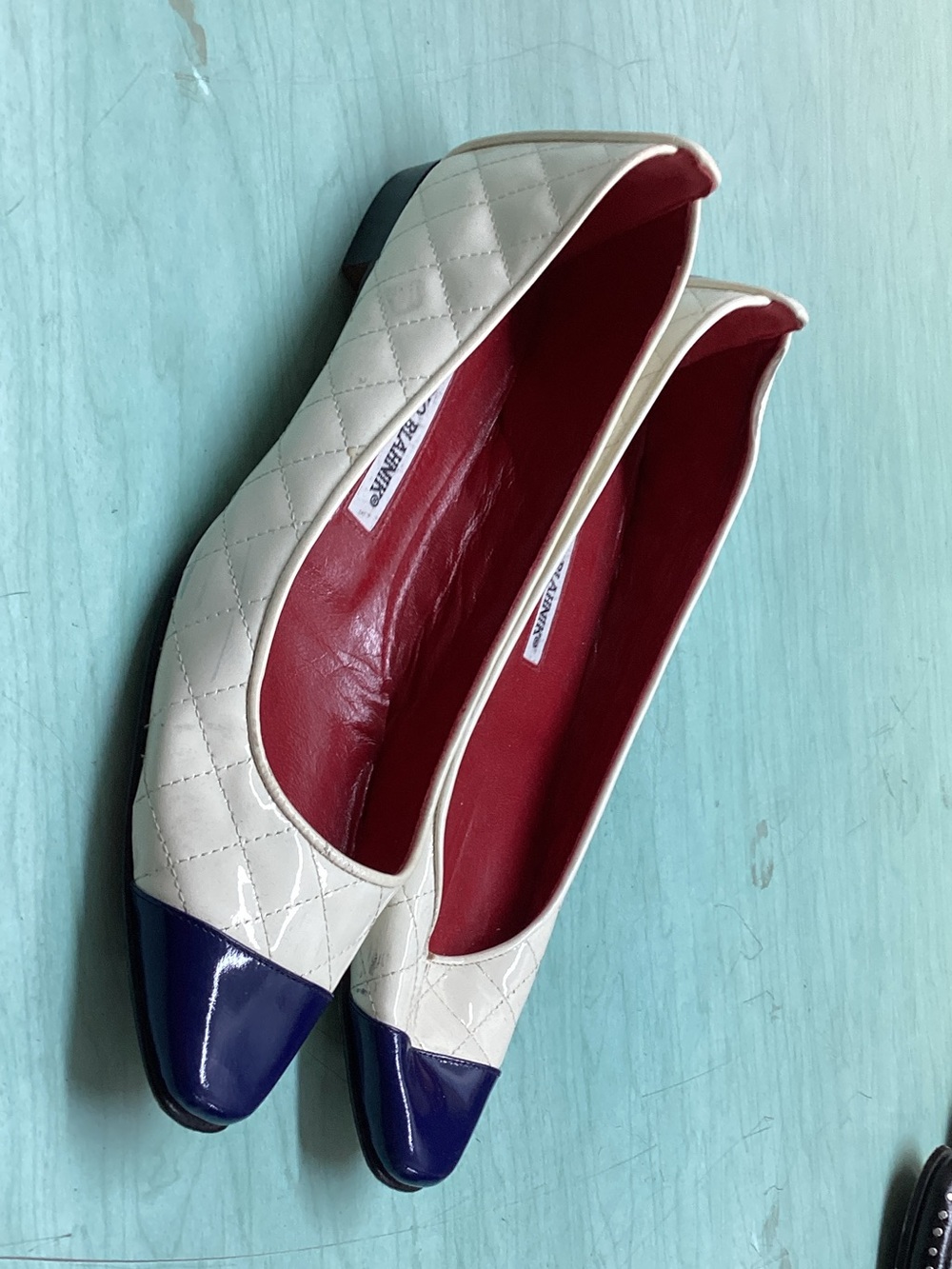 Manolo Blahnik Cream Quilted Flats with Navy Patent Cap Toe and Red Interior